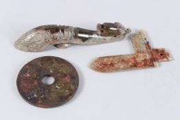 A CHINESE CARVED JADE BI DISC, BELT HOOK AND A BRACKET (3).