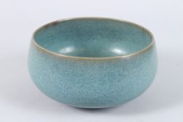 A CHINESE SONG STYLE PORCELAIN BOWL with turquoise glaze. 17cms diameter.