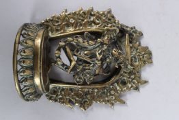 AN 18TH CENTURY TIBETAN OR NEPALESE BRASS DEITY. 6.5ins long.