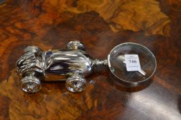 Magnifying glass, the handle modelled as a racing car.