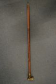 A novelty walking stick with telescope handle.
