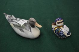 Royal Crown Derby duckling and a Royal Copenhagen duck.