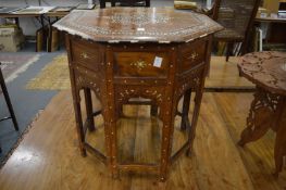 A good Moorish bone inlaid octagonal table with folding base.