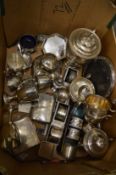 A quantity of silver trophy cups and other items.