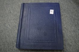 A stamp album and contents.