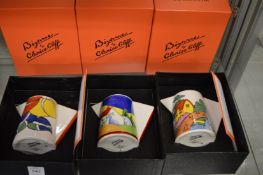 Three Wedgwood Clarice Cliff collection Bizarre conical milk jugs, all boxed.