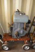 A Ruston & Hornsby Ltd Class PT 700/1000rpm stationary engine with purpose built carriage for