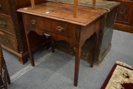 An 18th century yew wood single drawer side table (faults).