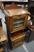 A Victorian walnut combination music cabinet and coal purdonium.