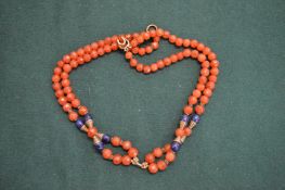 A carnelian bead necklace.