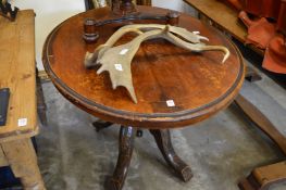 Victorian inlaid walnut oval pedestal table.
