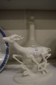 A Continental white porcelain model of a stag together with a Copenhagen white porcelain bottle