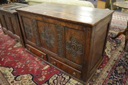 An 18th century oak mule chest.