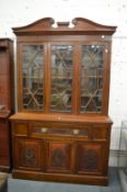 A Victorian walnut secretaire library cupboard bookcase.