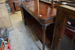 A mahogany two tier serving table.