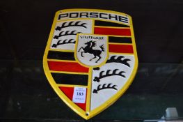 A cast iron sign Porsche.