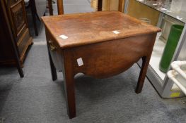 A 19th century mahogany commode.