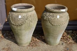 A pair of earthenware tapering planters or urns.