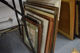A quantity of paintings and prints.