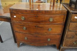 A 19th century mahogany bow fronted three drawer chest.