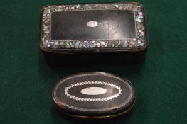 Two papier mache snuff boxes.