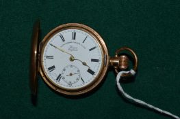 A gilt metal hunter pocket watch.