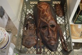 Carved wood masks.