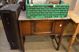 An oak and marble top wash stand.
