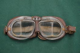 A pair of old motoring goggles.