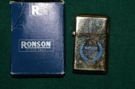 A Ronson cigarette lighter, boxed.