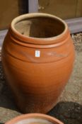 A very large salt glazed earthenware pot.