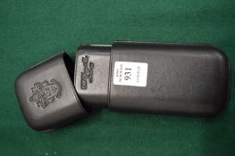 A leather cigar case.