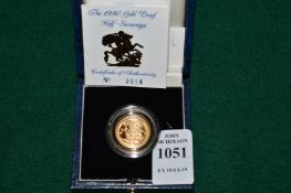 A 1990 proof half sovereign in fitted case with certificate.