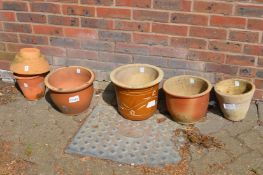A group of plant pots.