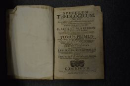 An 18th century book of Latin text dated 1740 and two other books.