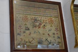 A Victorian framed and glazed sampler.
