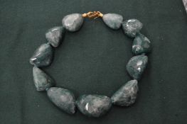 A chunky bead necklace.
