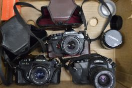 Three Cosina cameras.