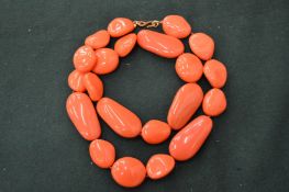 A Kenneth Lane vintage coral necklace.