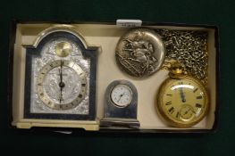 Two decorative pocket watches and two miniature clocks.