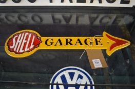A cast iron sign Shell Garage.