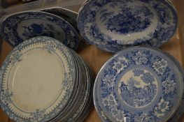 A quantity of blue and white plates and bowls.