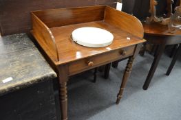 A Victorian mahogany washstand.