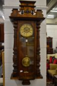 A Vienna style walnut cased wall regulator.