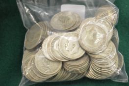 A large quantity of pre-decimal shillings.