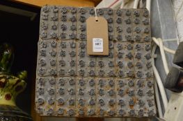 An old textile or wallpaper printing block.