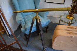 Brass telescope on stand.