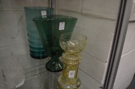 Three coloured vases.