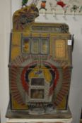 A Mills Company 'War Eagle' one armed bandit/slot machine circa 1930-1940, tired but in working