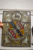 An armorial stained glass window.